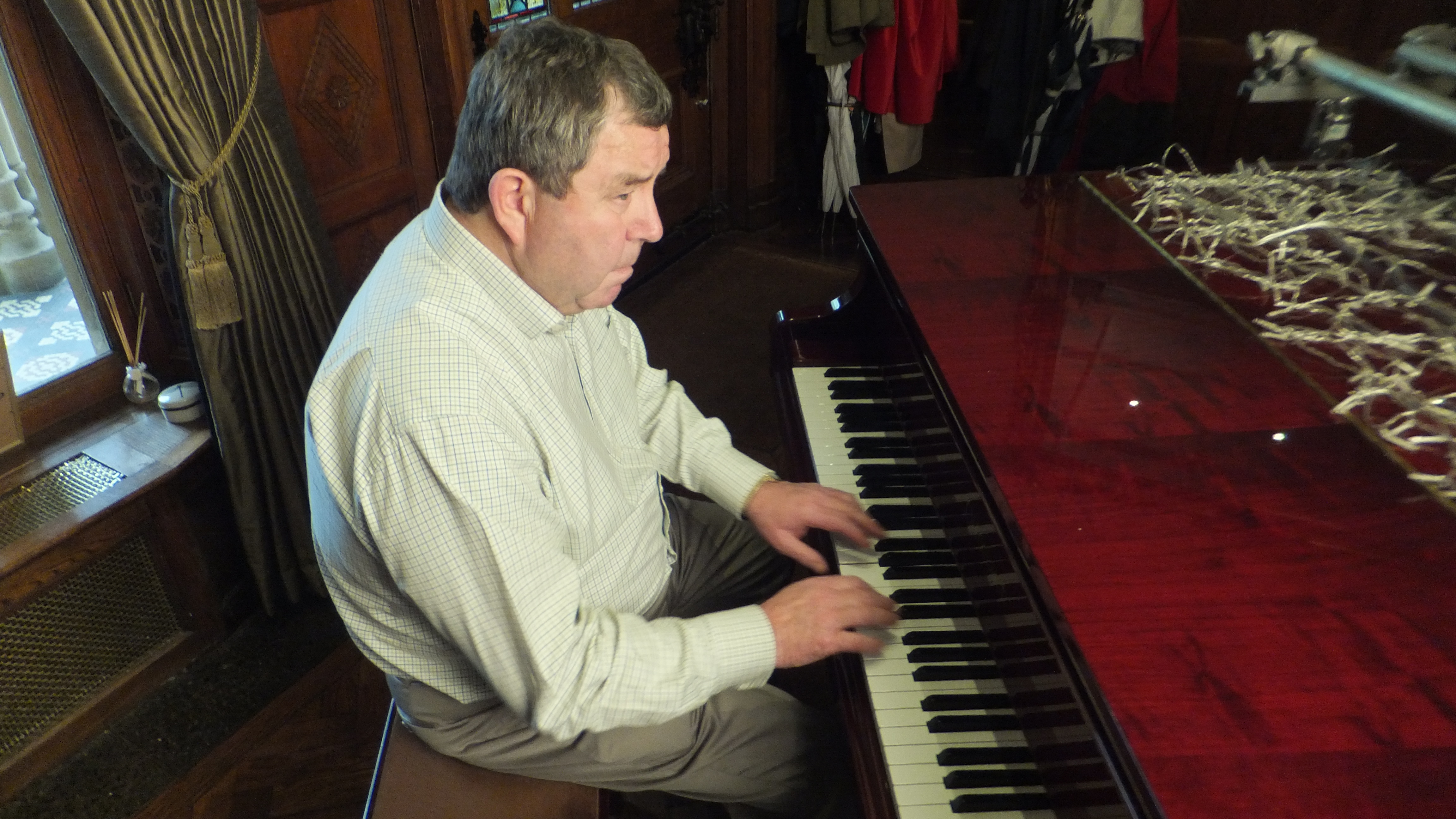 Composer Michael McDermott playing his composition IN YOUR ARMS