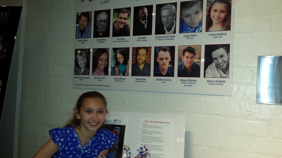 Lauren under the cast poster with her picture in Performance Riverside's production of Ragtime