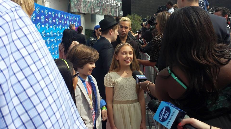 Lauren being interviewed on the red carpet at the American Idol finale