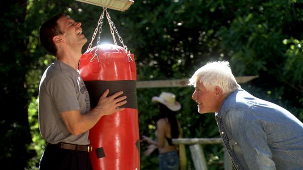 ACTOR MICHAEL WORTH AND ACTOR TIM THOMERSON IN A SCENE FROM 