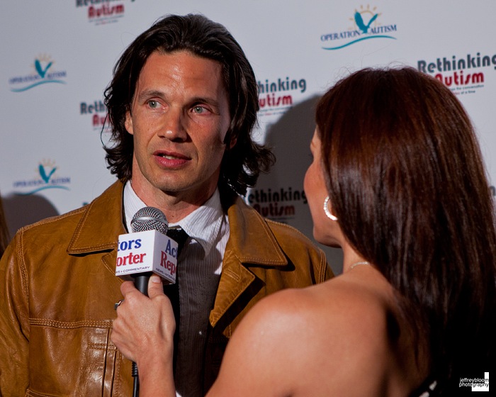 Actor, writer and director Michael Worth at the special screening at SONY pictures being interviewed by C. C. Perkinson for Actors Reporter