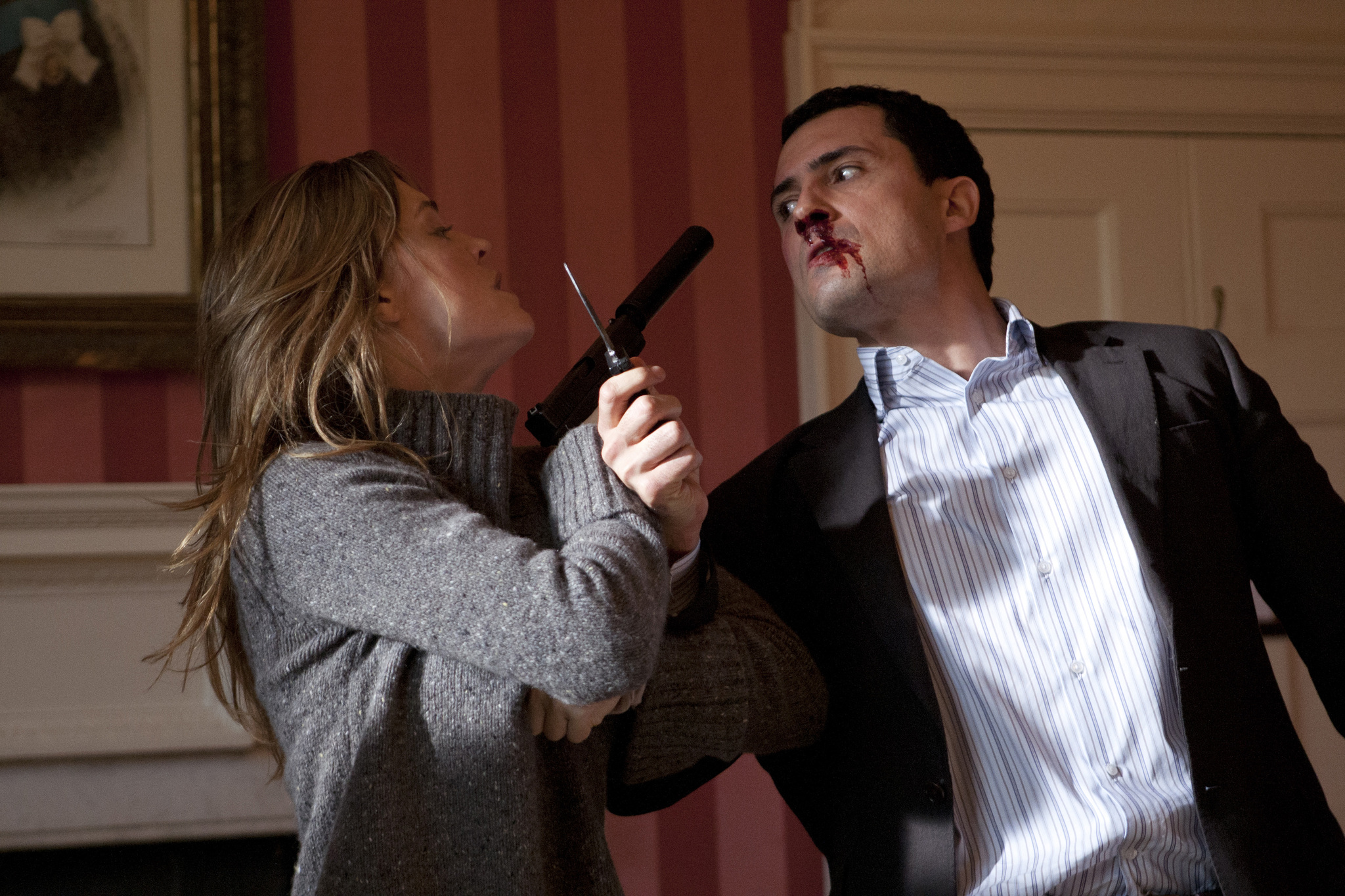 Still of Melissa George and Dhaffer L'Abidine in Hunted (2012)