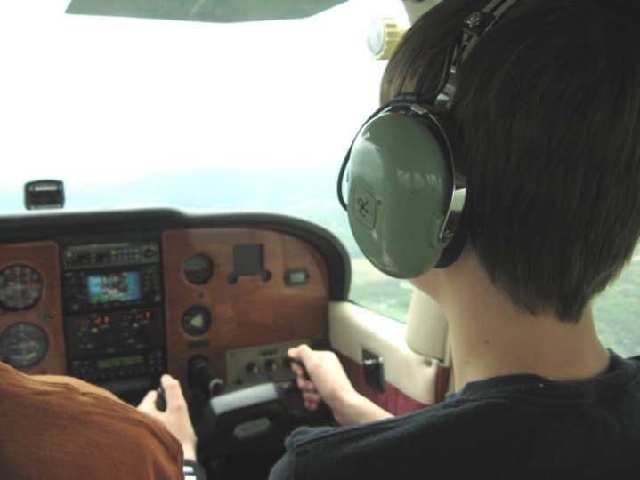 Aidan Roth piloting a plane.