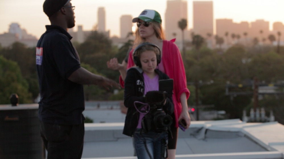 Still of Rya E'met, XCalibur and Poppy in Rooftop music video.