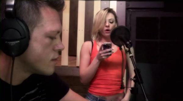 Bailey Blue singing in her audition for music producer and porn star, Jamie Stone. Jamie Stone jokes around about Dahlia Sky needing a good name to sing right, so he insists she continues to perform as Bailey Blue.