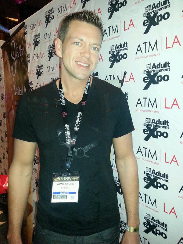 AVN Adult Entertainment Expo featuring Jamie Stone at his booth.