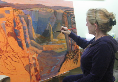 Kathaleen Brewer working on Canyon De Chelly paintng