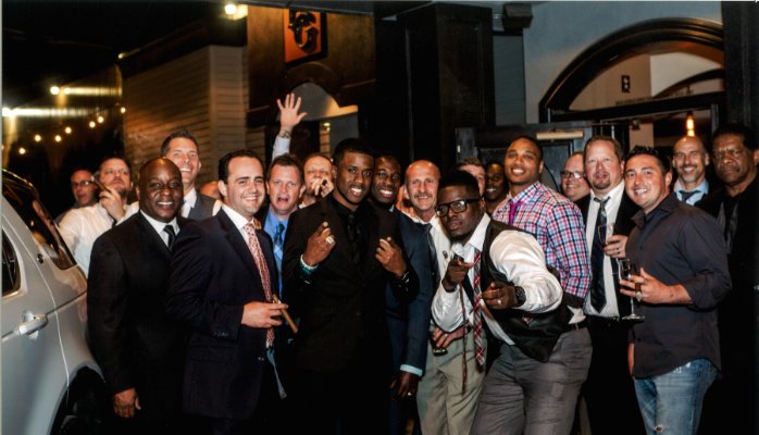 Athletes + business men & women (not pictured) at charitable fundraiser, Seattle.