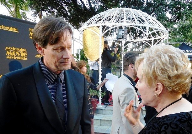 Dr. Diane Howard, interviewing Kevin Sorbo (a dear man) on red carpet at 24th Annual Movieguide Awards Gala, 2016, as interview, journalist