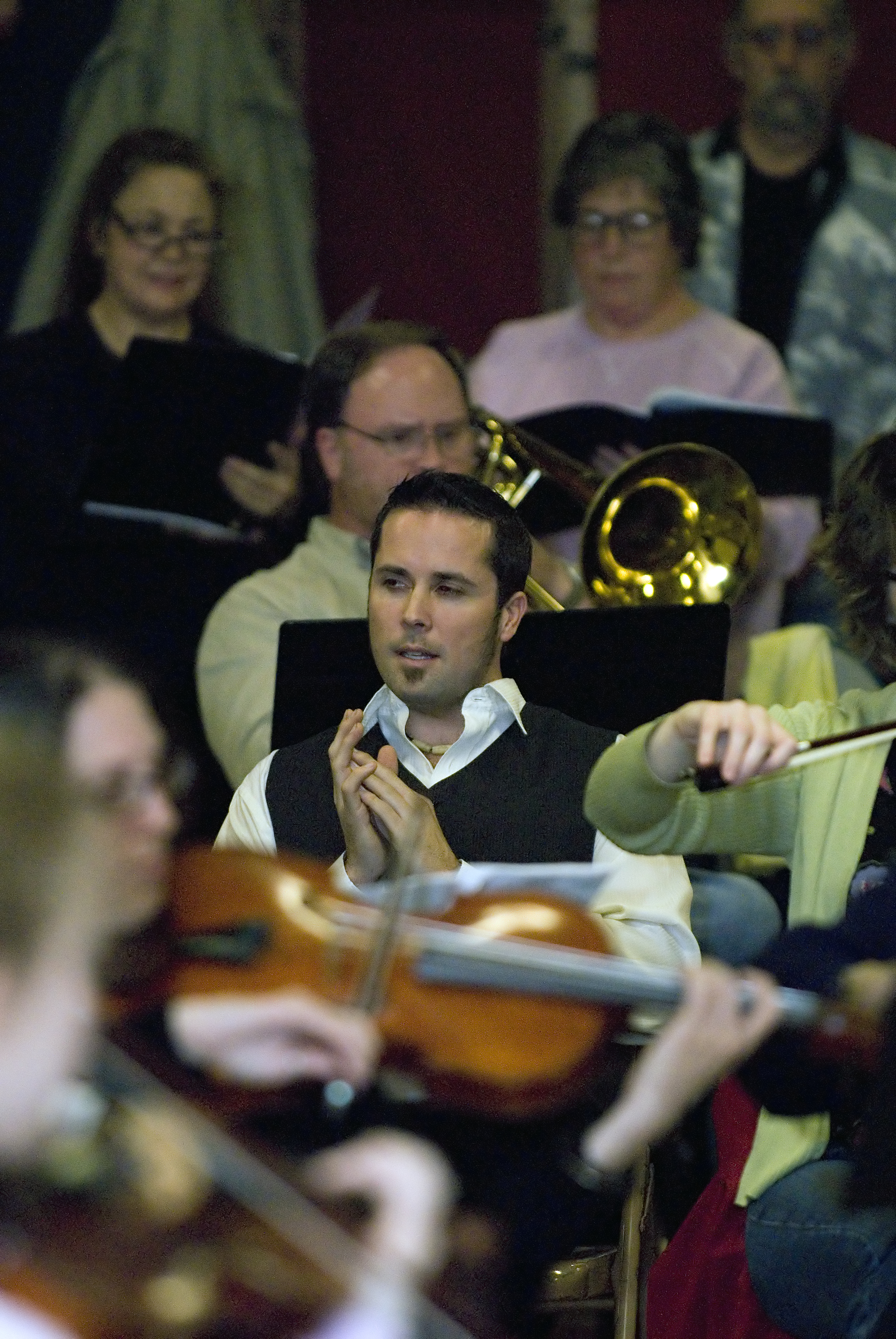 Mateo Messina in recording studio with the orchestra.