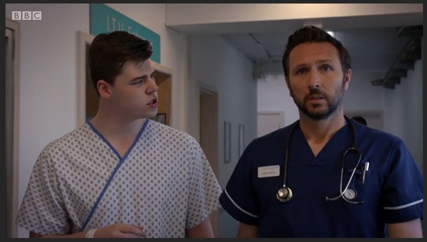 Max J Green as Stephen Holting in a scene with Alex Walkinshaw as Fletch in Holby City, Episode Title Return to Innocence. S17 Ep 42. All time Episode Number 777