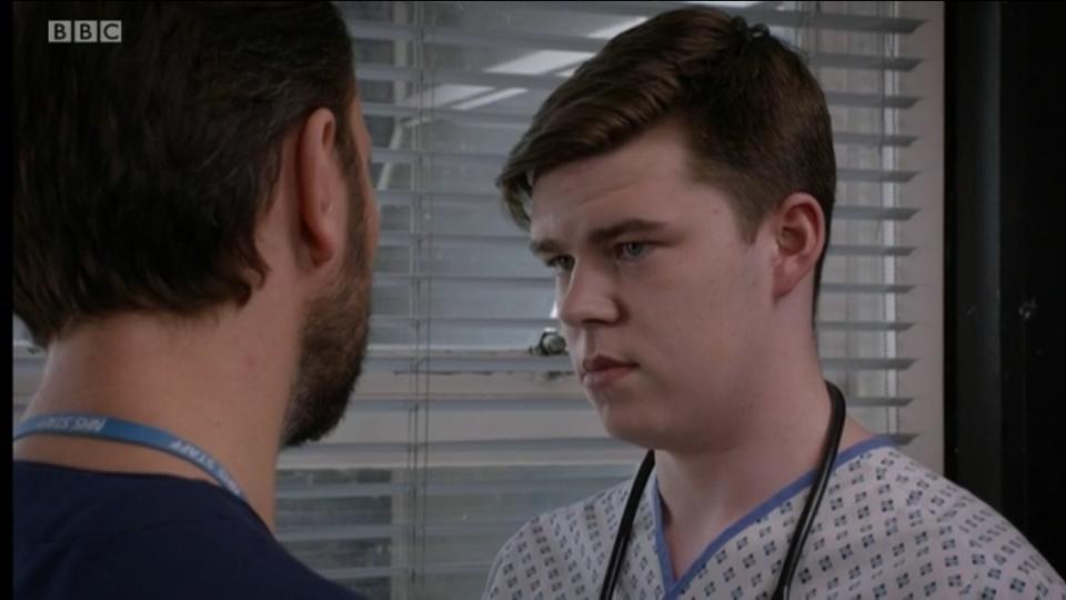 Max J Green as Stephen Holting in a scene with Alex Walinshaw as Fletch in Holby City. Episode Title Return to Innocence S17 Ep 42 All time Episode Number 777