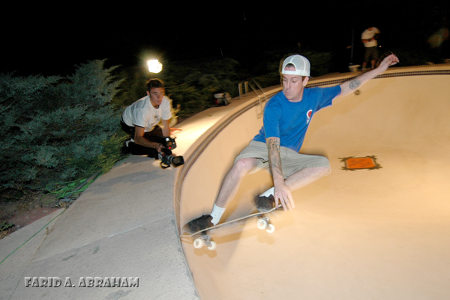 Benji Lanpher filming professional skateboarder Rob Palmer in New Mexico.