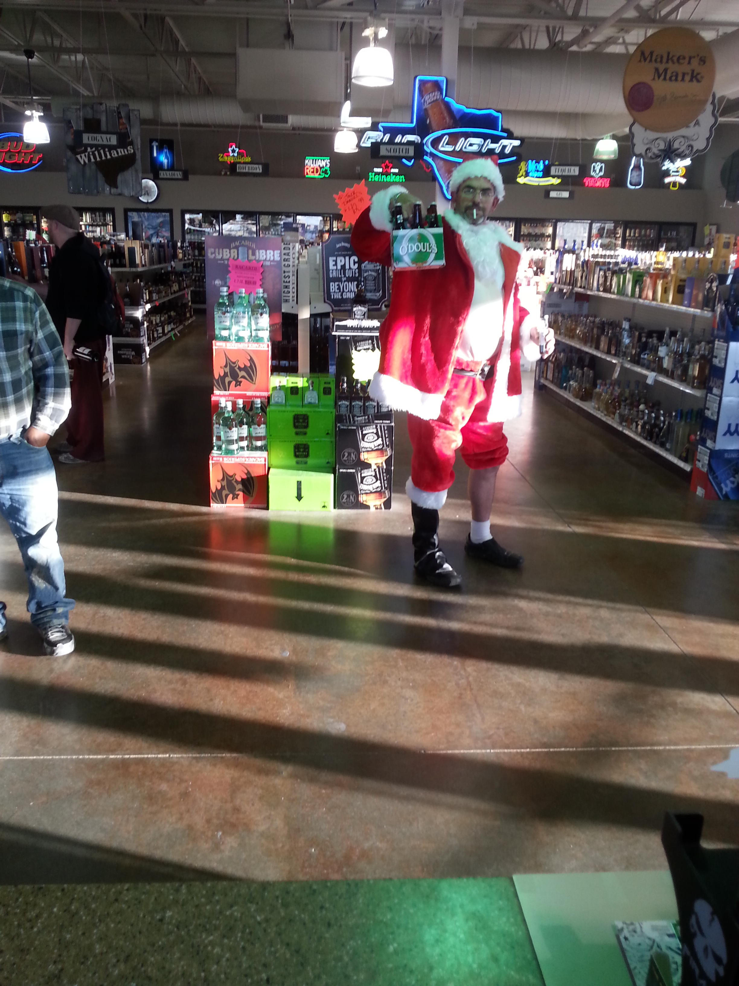 Bad Santa getting the little kiddos non alcoholic beer for Christmas