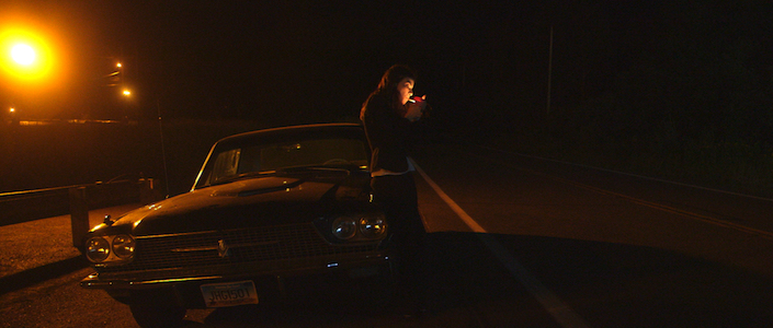 Victoria stops for a smoke during her long journey home to Duluth