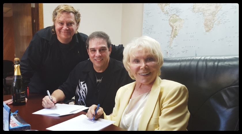 A BearManorMedia Book Contract signing for Joan Benedict Steiger & David Minasian with Pierre Patrick at our Jerry Pace Agency.