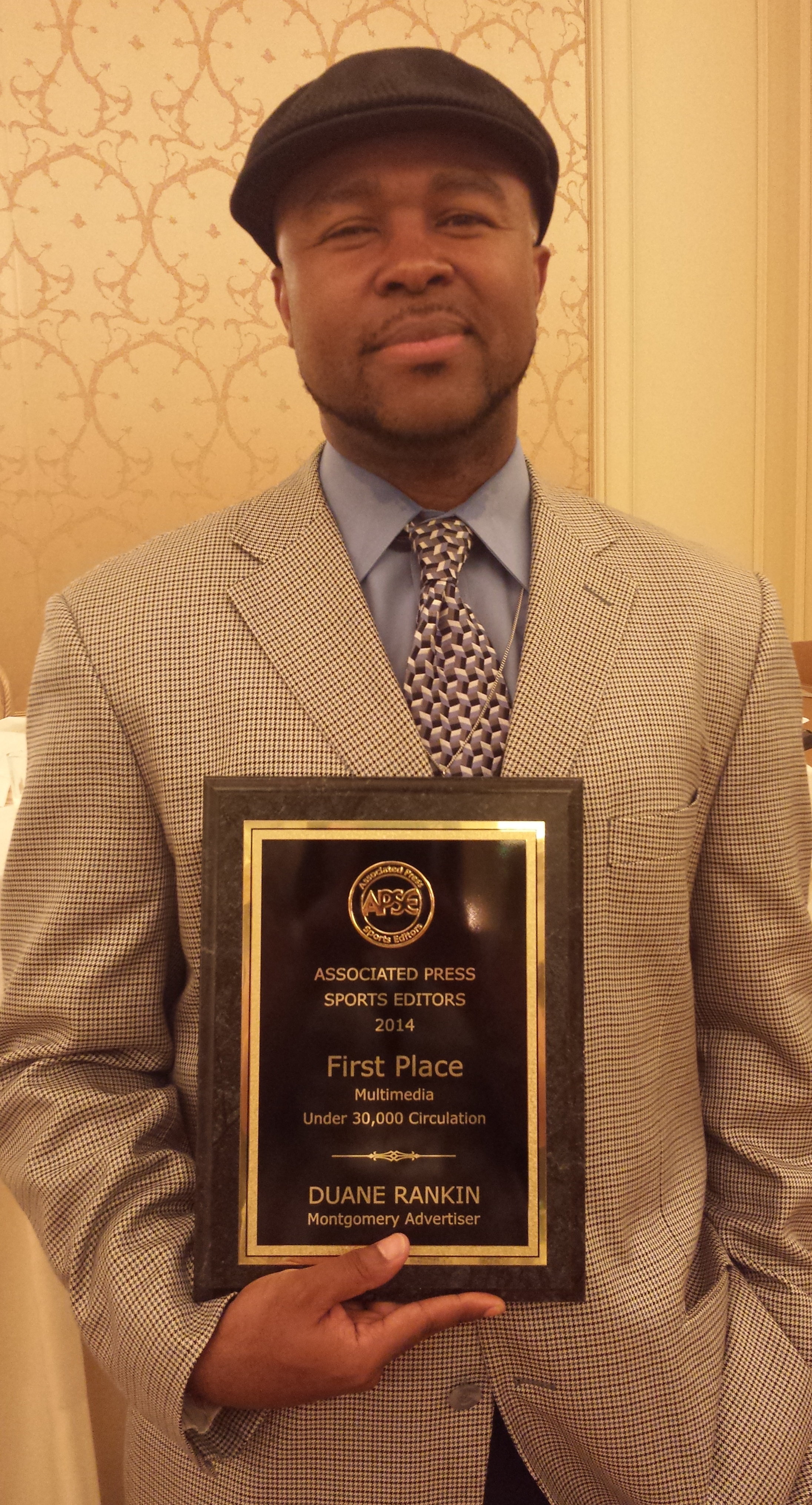 Duane Rankin received a 2014 APSE first-place award for multimedia journalism.