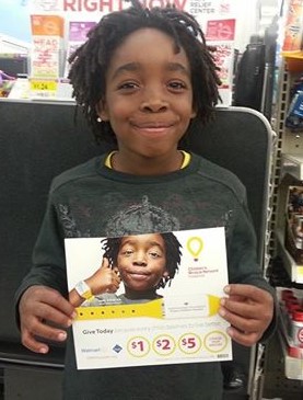 Samuel was chosen to be Children's Miracle network Nation Wide Ad campaign Model. Found himself in the store!!