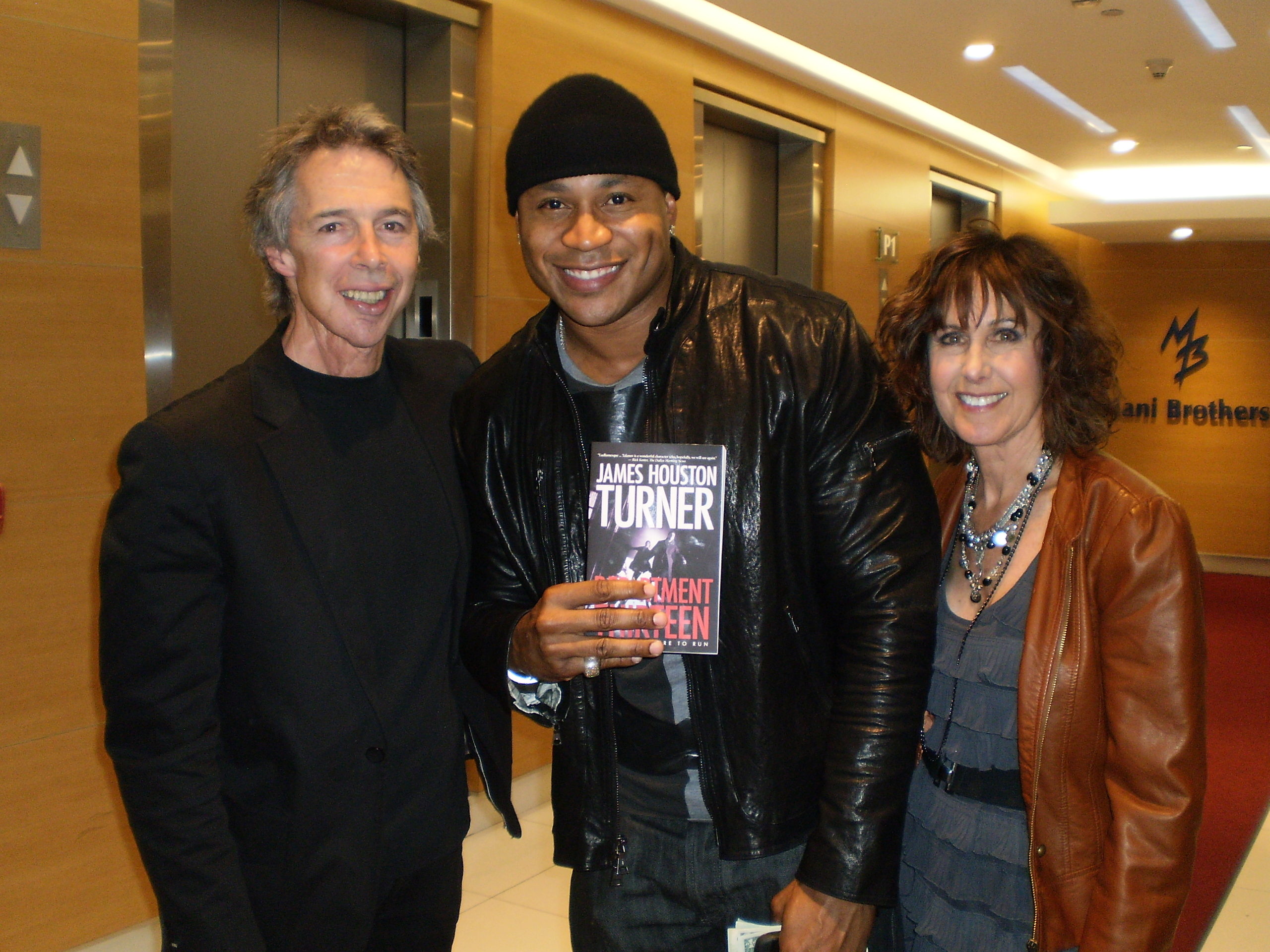 James Houston Turner and his wife, Wendy Turner, with LL Cool J, at the end of James's Department Thirteen book tour, Los Angeles.