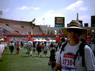 Red enters the after party of the 2002 Entertainment Industry Foundation  Revlon Walk / Run for Women, as participants were beginning to arrive at the Los Angeles Memorial Coliseum. Kenny Loggins & band played live.