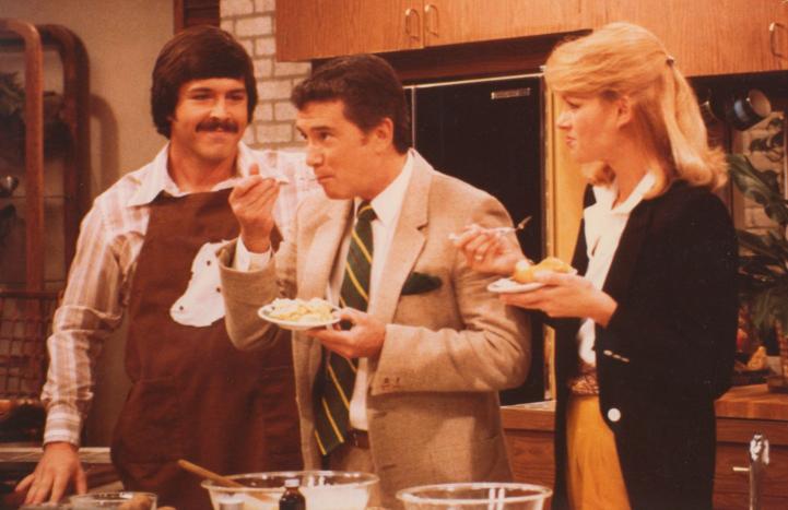 Author James Houston Turner serves German Potato Custard to 'Regis Philbin' (qv) and 'Cyndy Garvey' (qv) on A.M. Los Angeles. After sampling the dessert James had made, Regis remarked, 