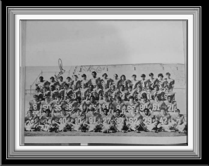 Ronnie C. Wright Football Captain with the ball and Team of Titans