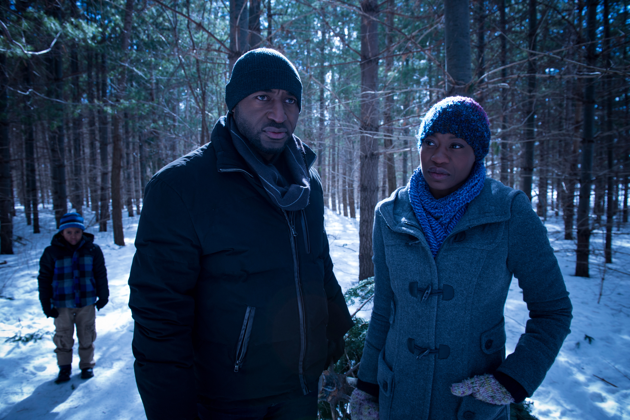 Still of Adrian Holmes, Oluniké Adeliyi and Orion John in A Christmas Horror Story (2015)