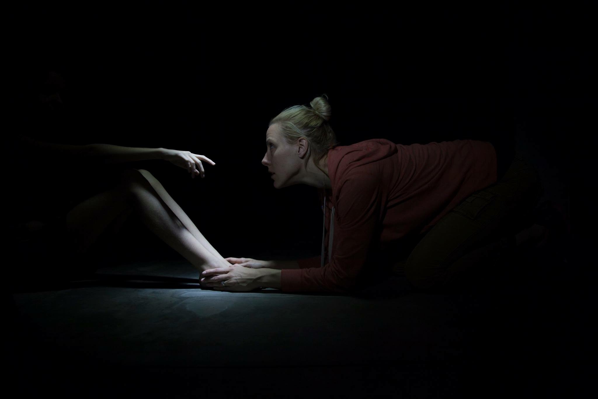 Production Still of Cradled in Black