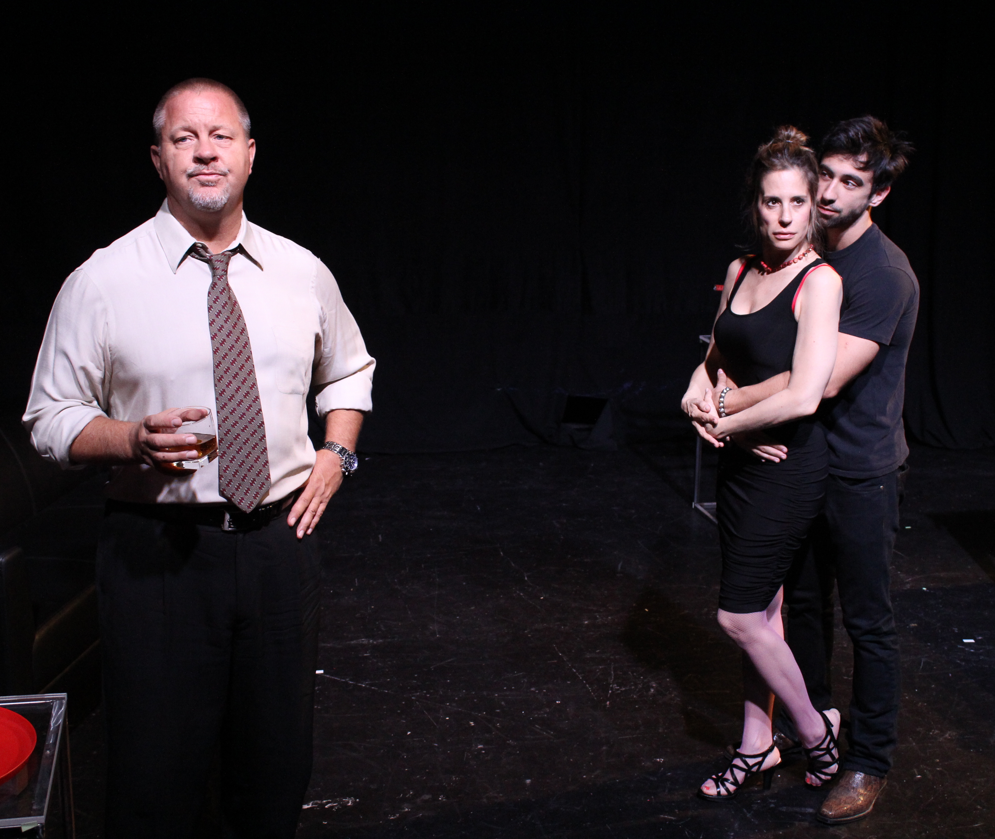 John Lacy, Elizabeth Greer, and Brad Culver in Guy Zimmerman's The Black Glass at the Open Fist Theatre.