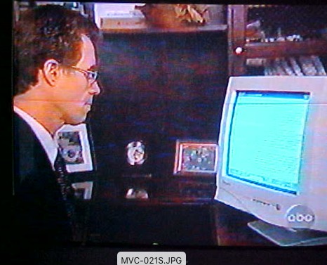 Dr. Fleming on 20/20 showing results to film crew on the computer.