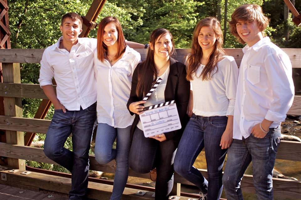 Cast and director in the middle of feature film 