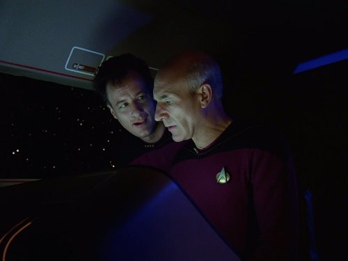 Still of Patrick Stewart and John de Lancie in Star Trek: The Next Generation (1987)