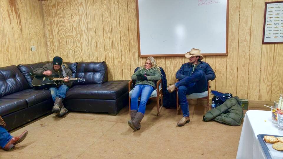 Theresa Cook, Nathan Keyes, and Jon Voight (far left corner, boots) relaxing between scenes on the set of JL Ranch.