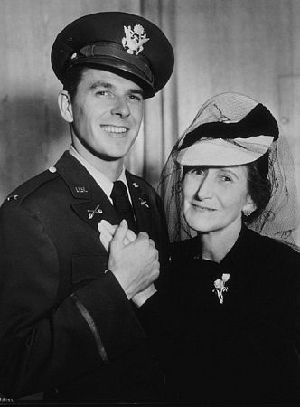 Ronald Reagan in uniform with his mother C. 1942