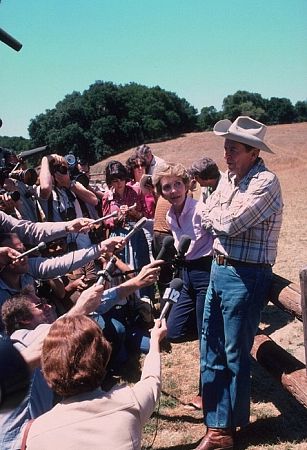 Ronald Reagan with Nancy Reagan and the press