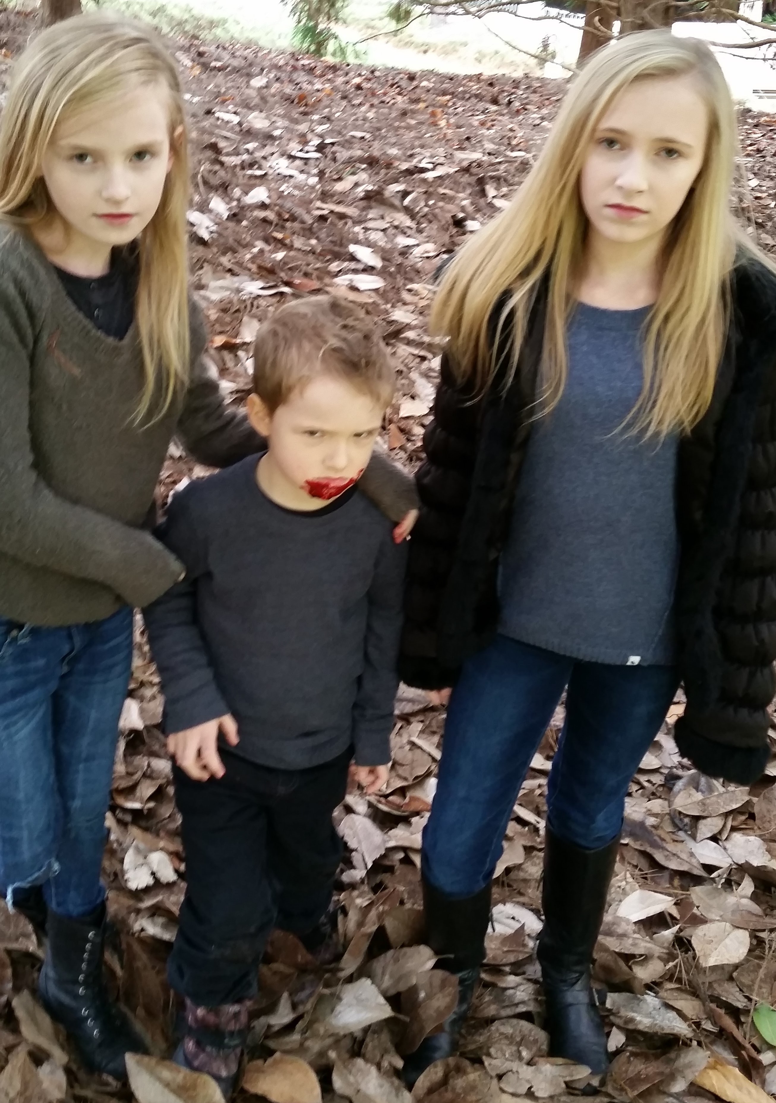 Landon and his sisters, Anaka and Karolina filming on set of 