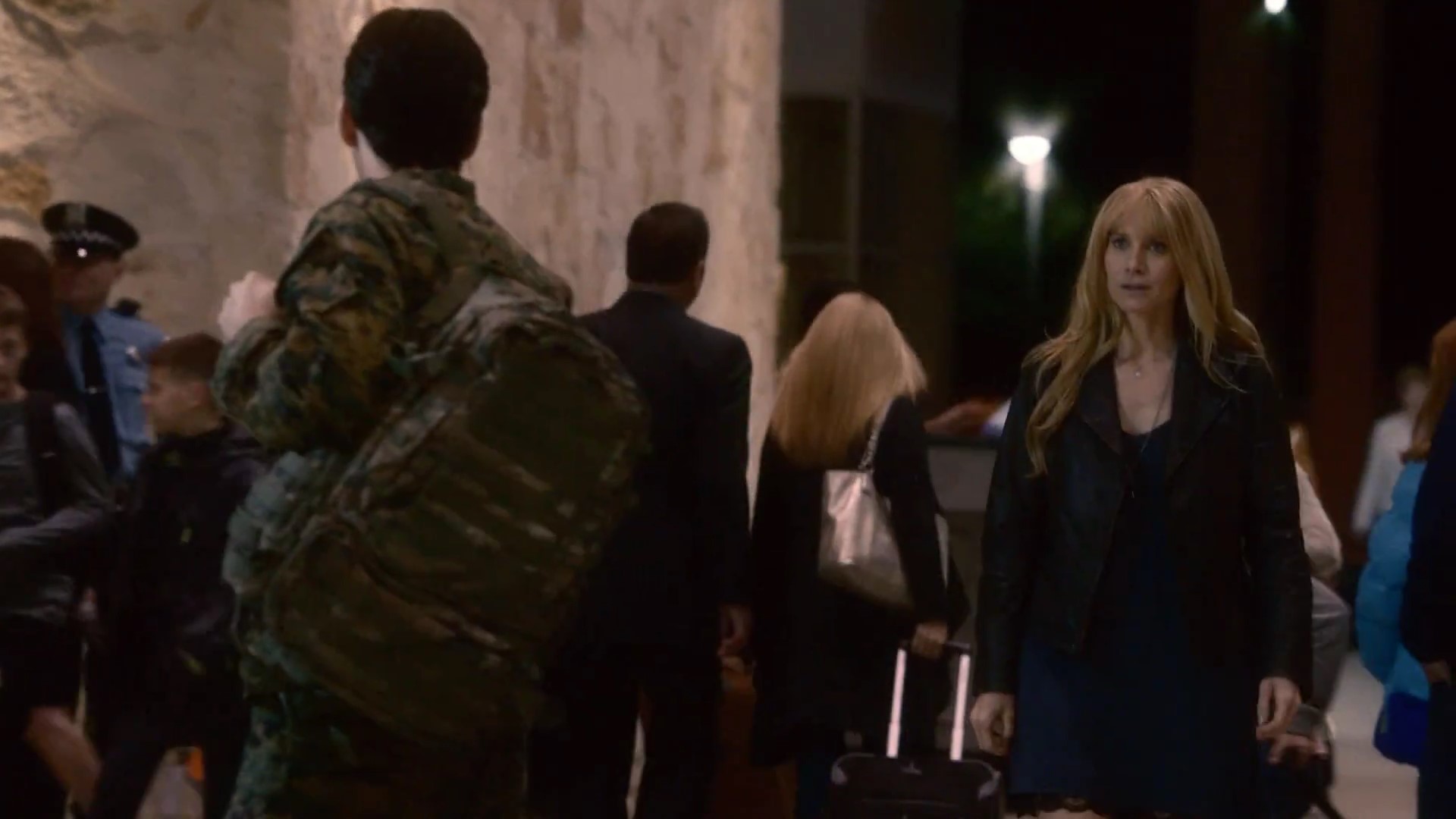 Airport Traveler's Kid in Revolution. Right between Billy Burke and the Policeman.
