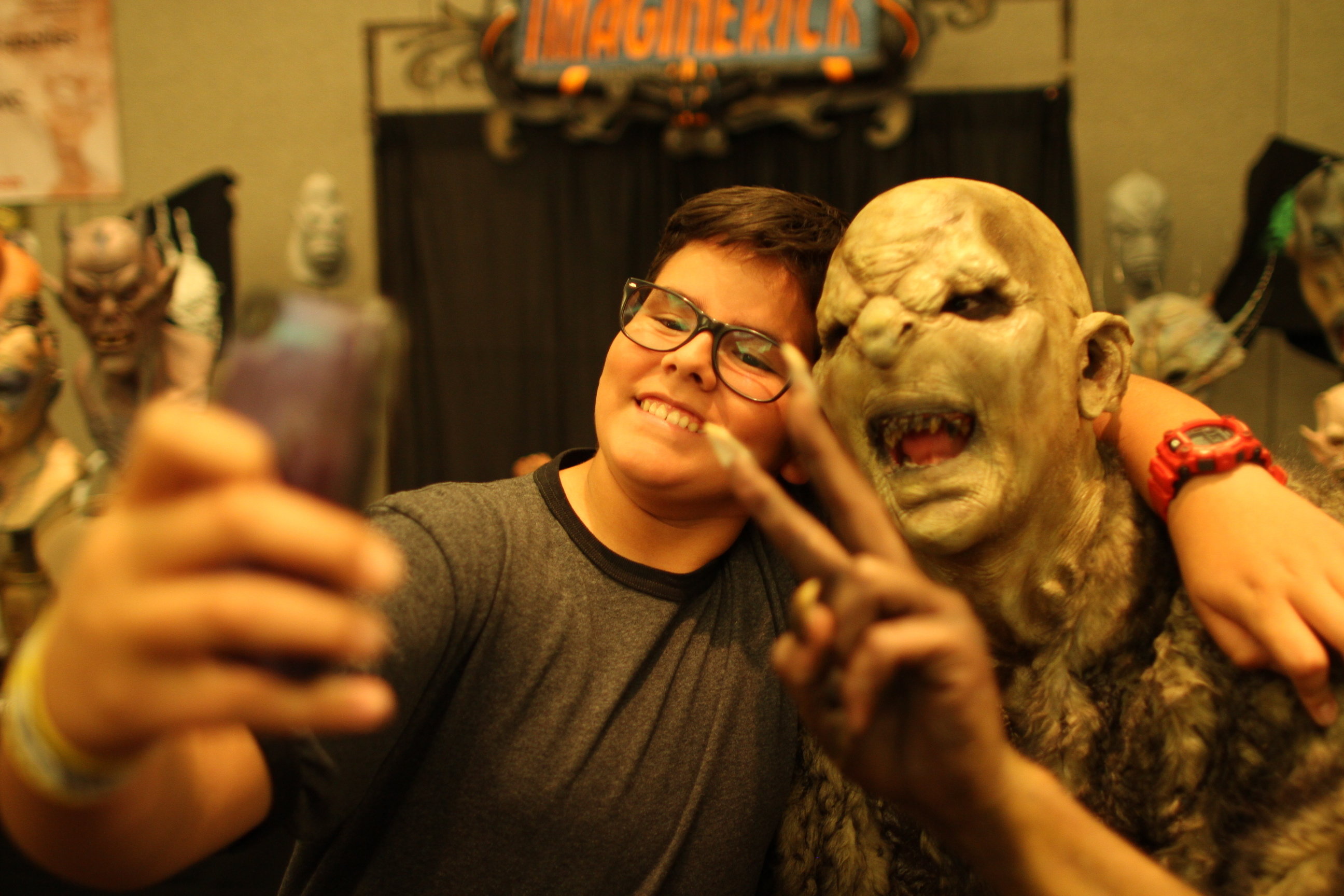 Alan Maxson poses for a picture with a fan at Monsterpalooza 2014.