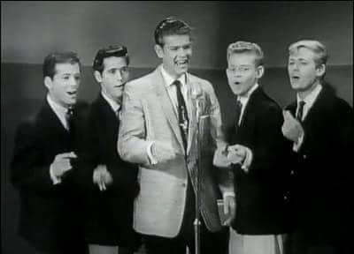 2nd from the right with the big ears early television