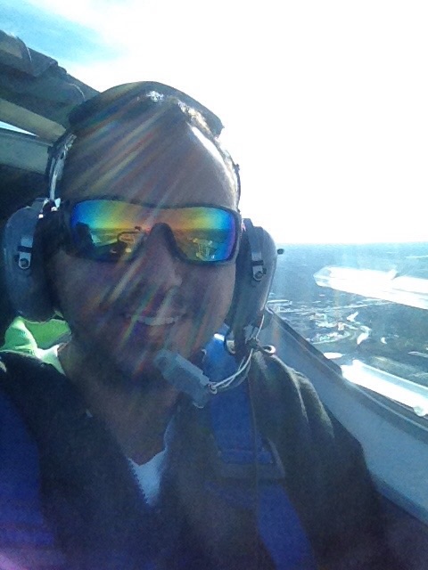 Flying over city in small single engine.