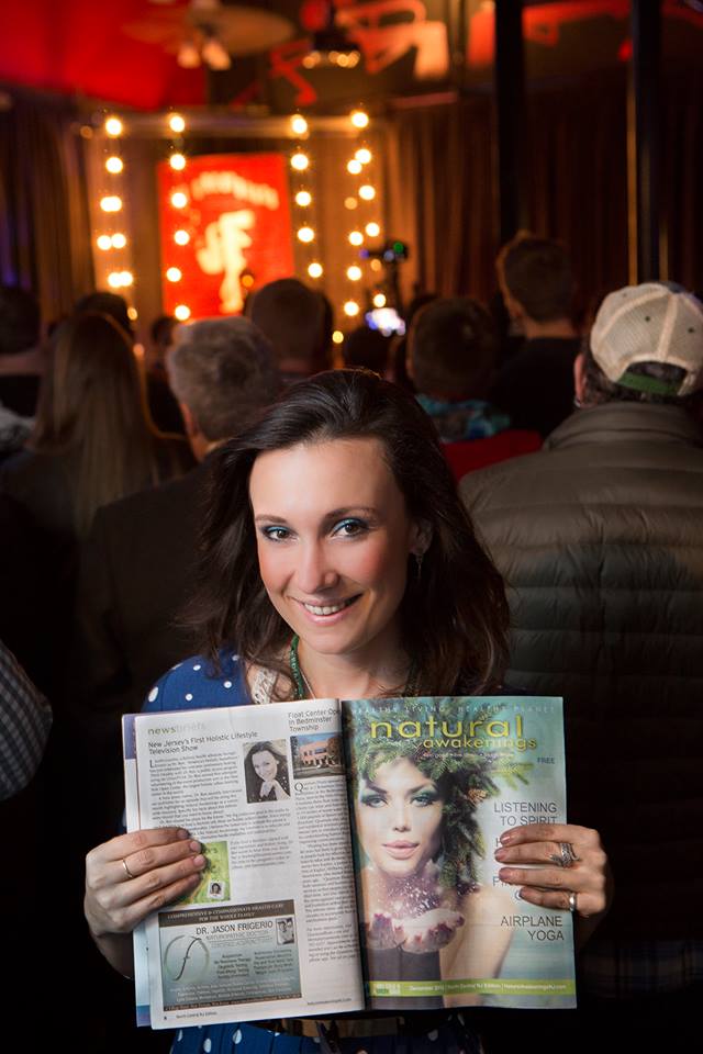 Laurén Laurino holding the Natural Awakenings Magazine Publication which 'Think Healthy with Dr Ren' was featured in December 2015.