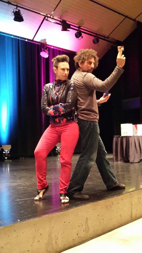 Laurén Laurino assists David Wolfe raffling off the Nutri Bullet at a live event.