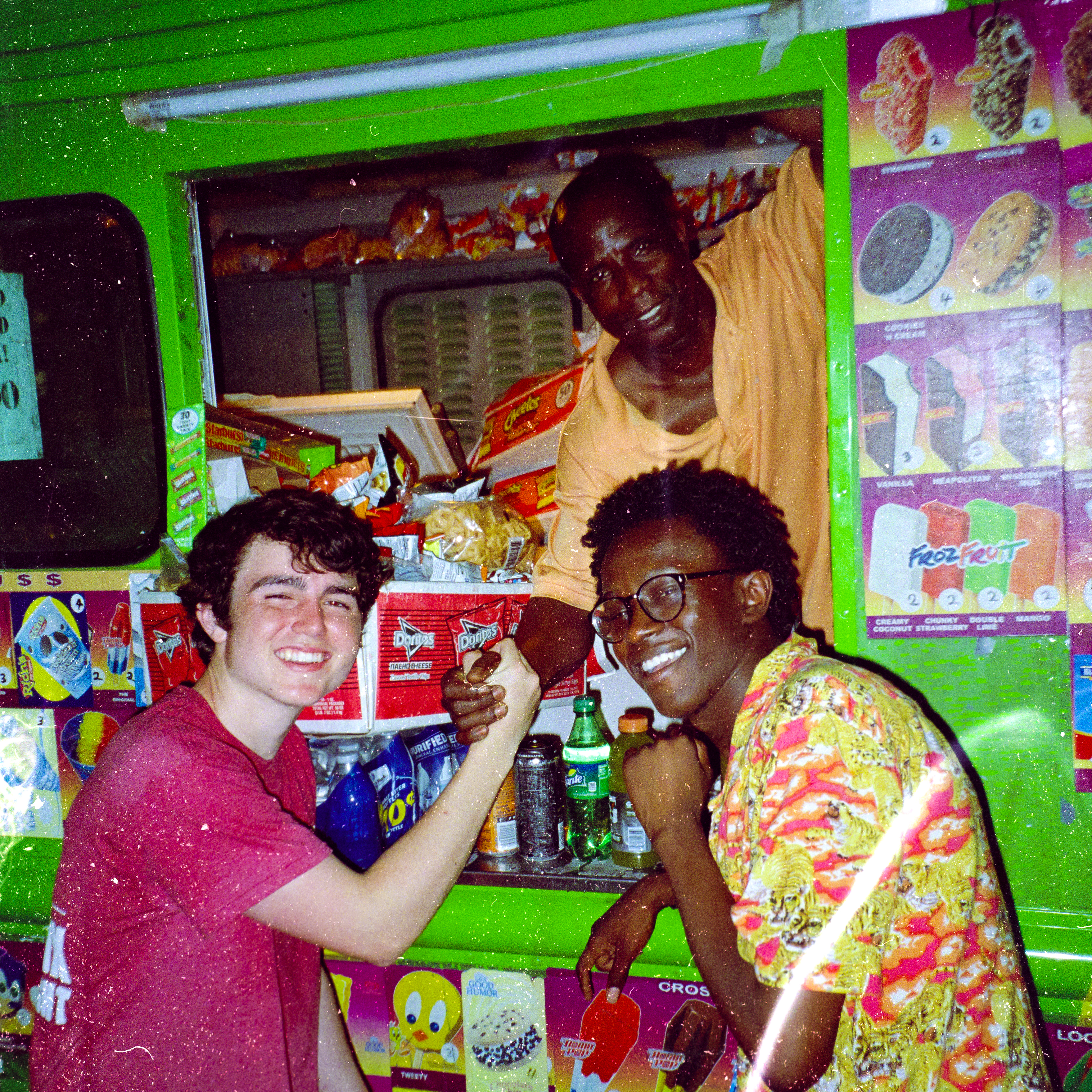 Antonio Chicaia with friends in front of an ice cream truck.