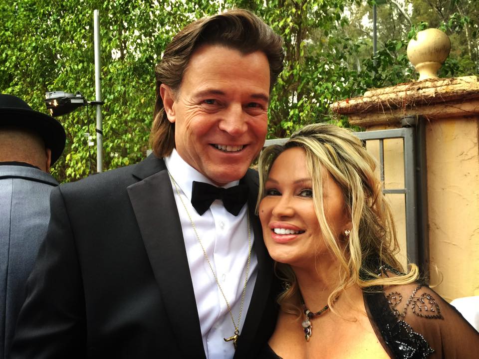 Brett Stimely with Lisa Christiansen at the Oscars 2015.