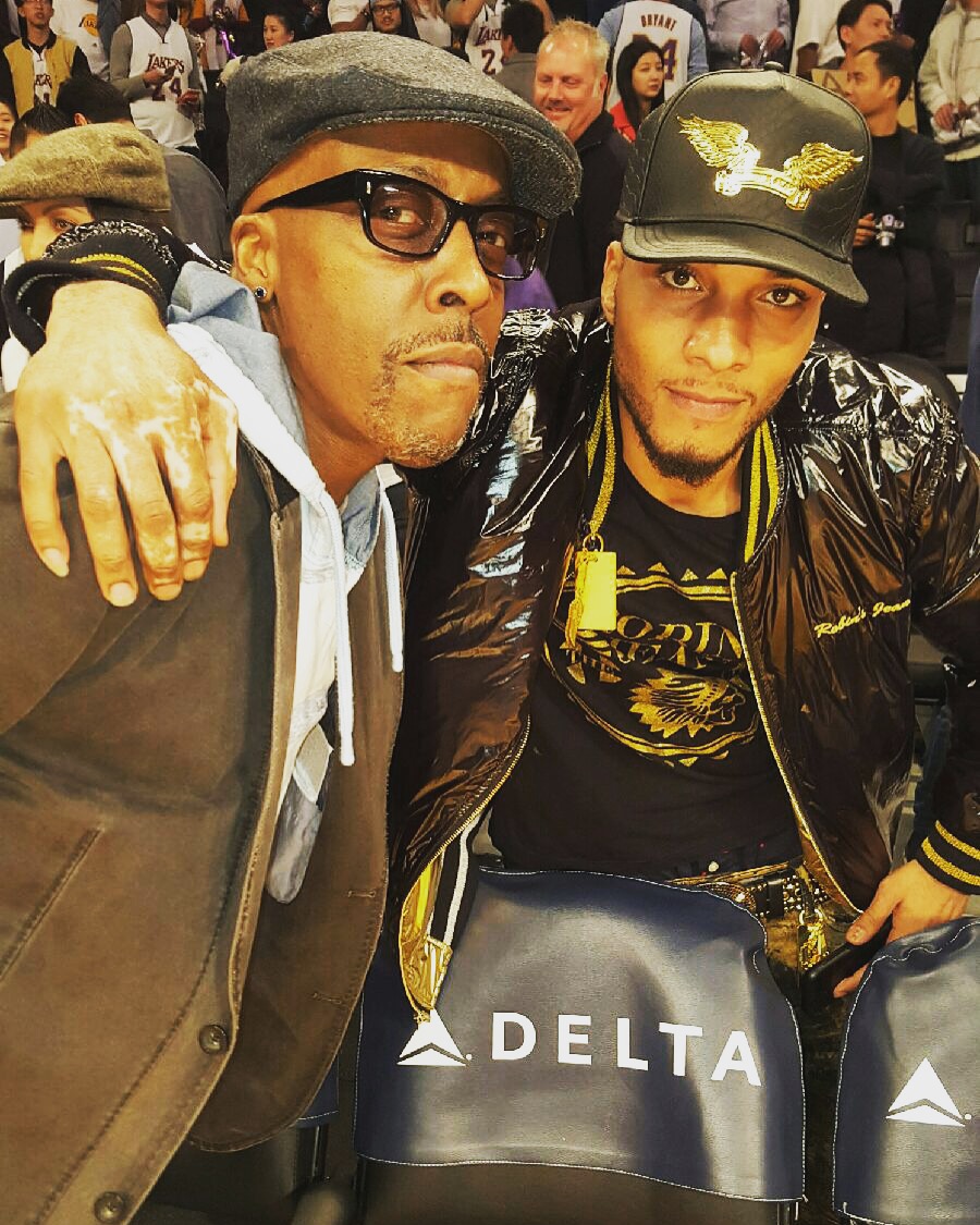 Floor seats at the lakers game, me and Arsenio hall took a picture after a five minute conversation, about getting started in the industry..