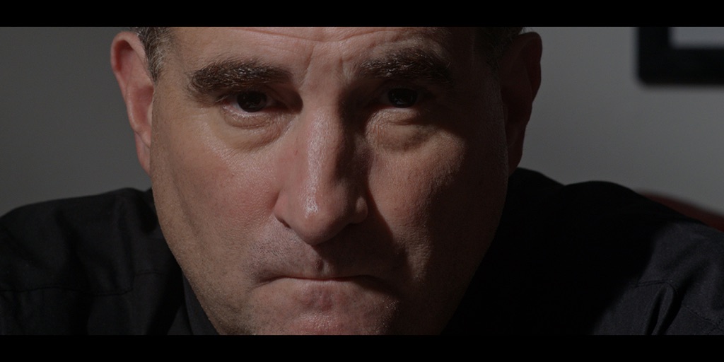 Jimmy Palumbo as the Monsignor in Conundrums