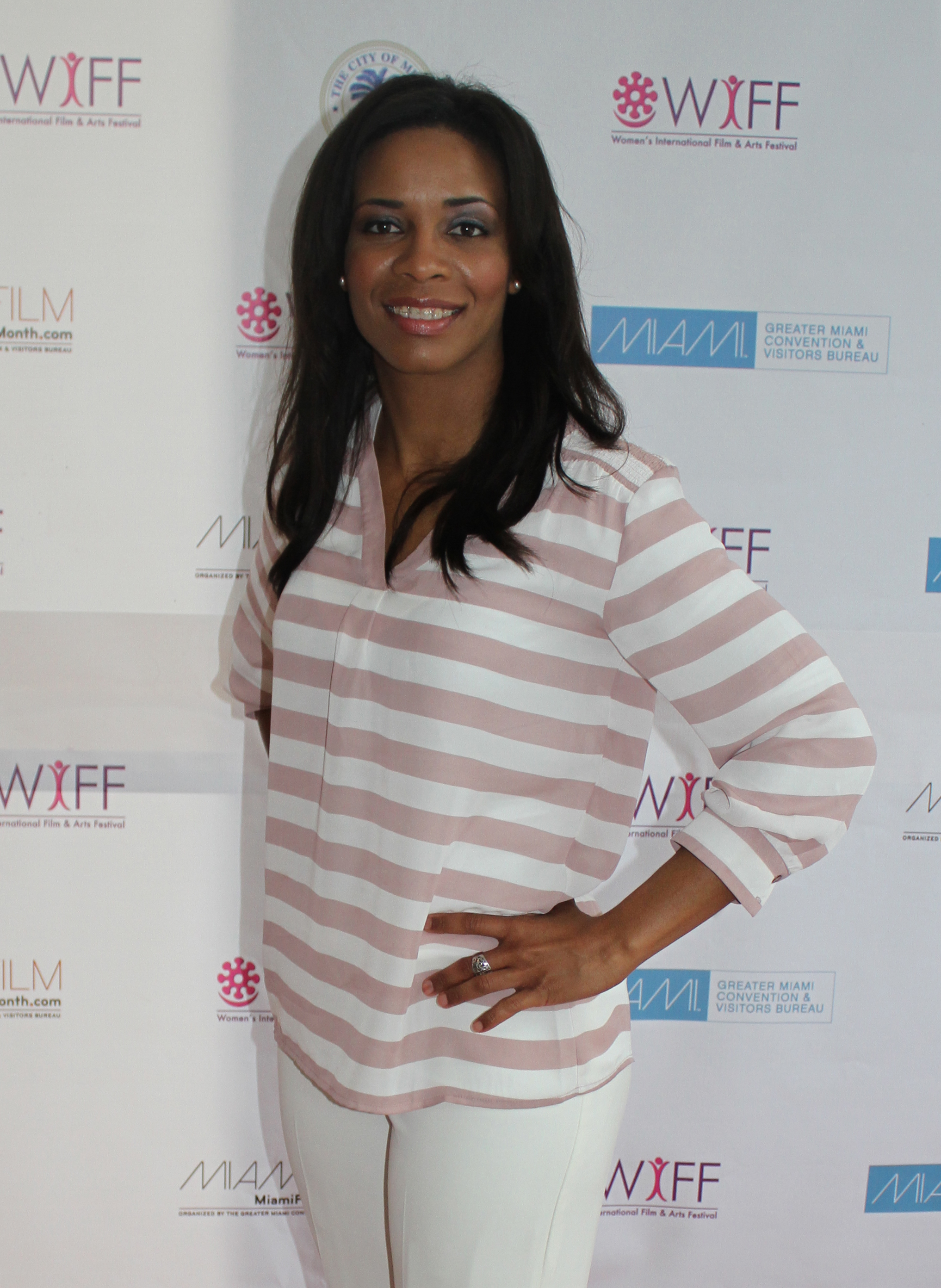 Dreka Shevon at the Women's International Film Festival in Miami where not only did her film, the Companion walked away with an award, by the hot young writer/producer also shared her wisdom while speaking on the Domestic Violence Panel
