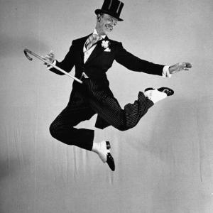 Fred Astaire does a climatic jump during his 