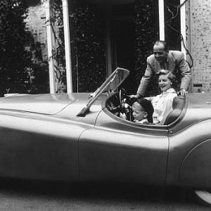 Humphrey Bogart, Lauren Bacall and son Stephen in his Jaguar XK 120