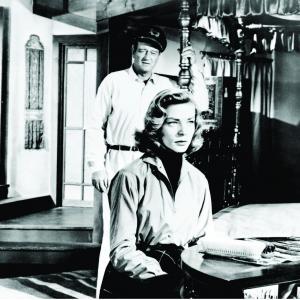 Still of Lauren Bacall and John Wayne in Blood Alley (1955)